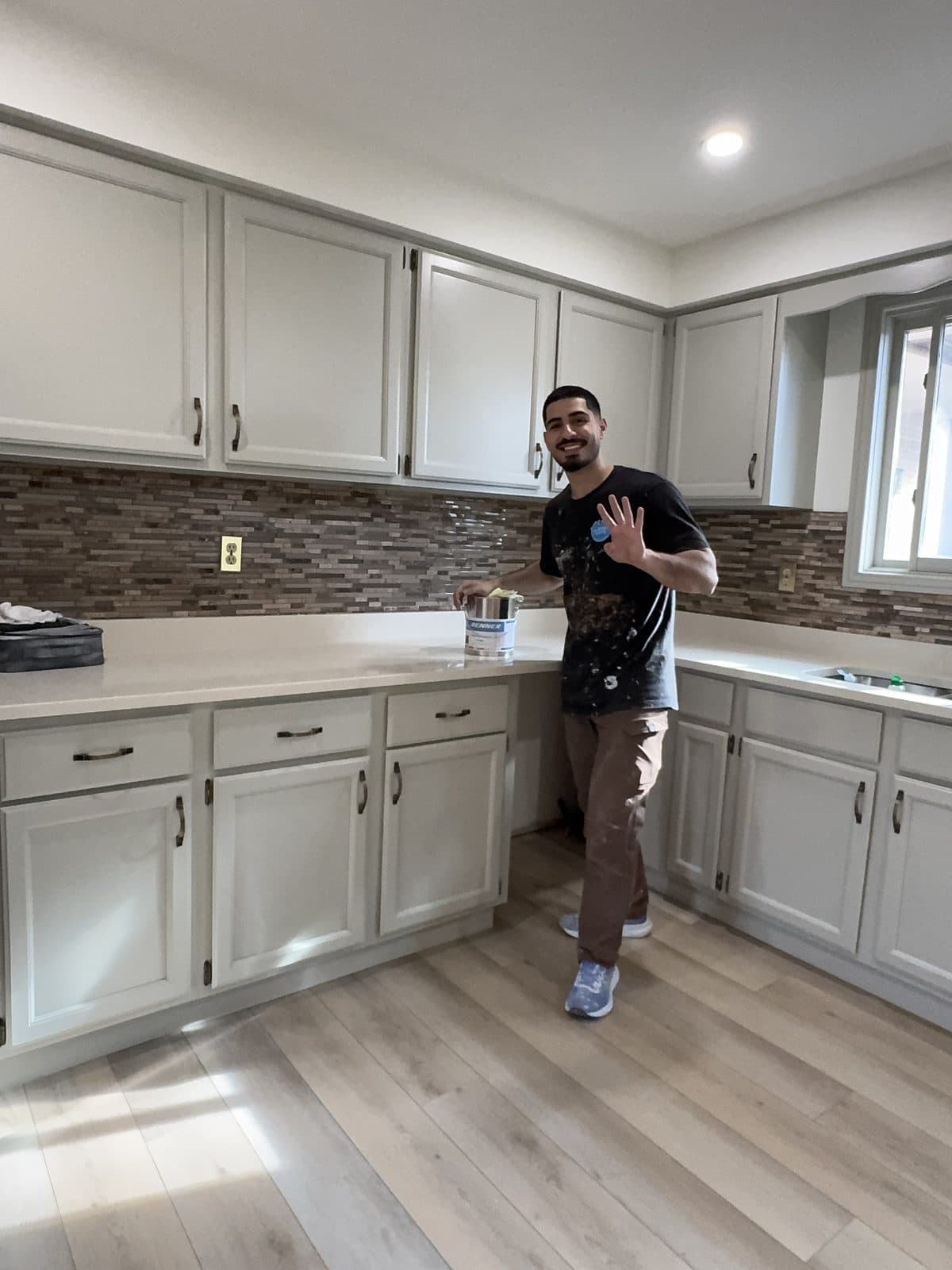 Gray cabinet refinishing project Gray kitchen cabinets refinished with a smooth sprayed Renner coating